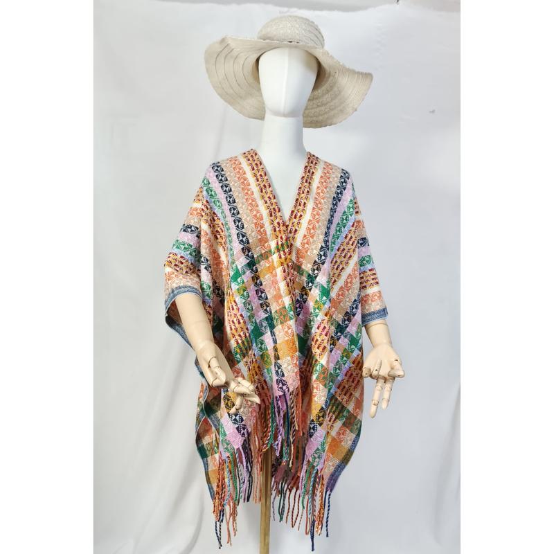 Fargerik poncho med geometrisk mønster