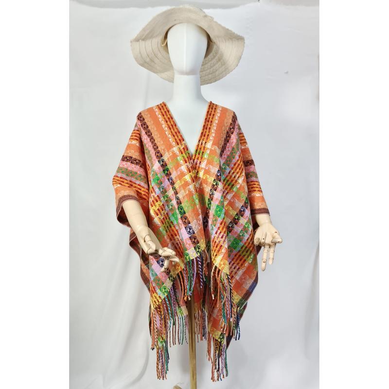 `Oransje håndvevd poncho med geometrisk mønster